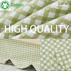 Brandream four-sided crib skirt with 16-inch drop on a standard crib.