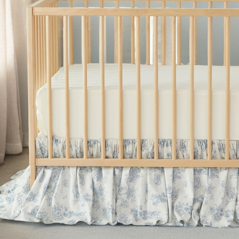 Brandream nursery setup featuring this skirt complements blue decor