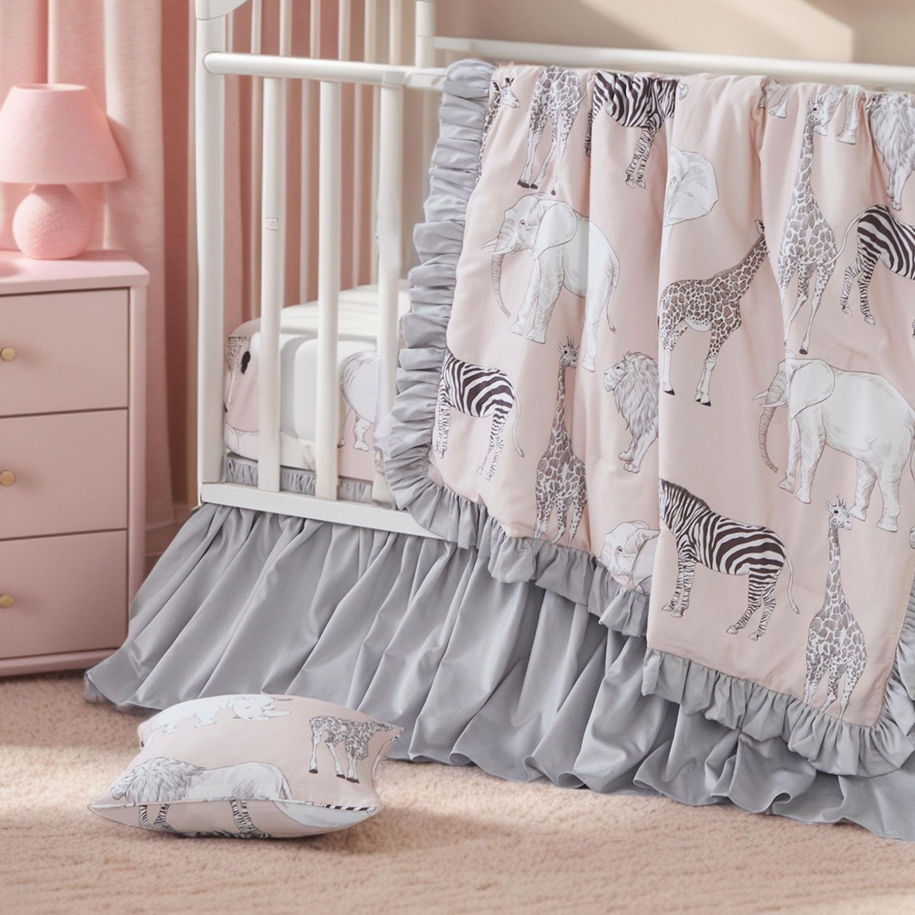 Brandream embroidery detail highlights animal characters on the bedding