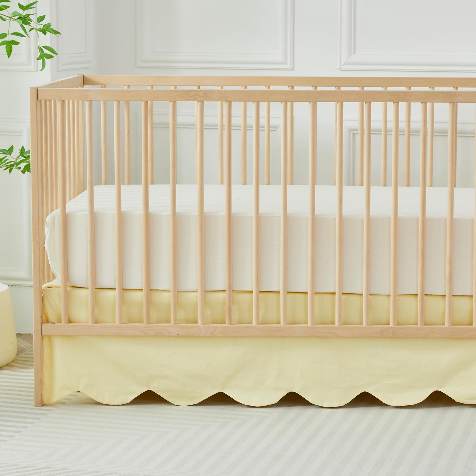Brandream scallop edge crib skirt adds soft yellow charm to the nursery