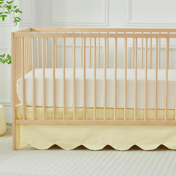 Brandream scallop edge crib skirt adds soft yellow charm to the nursery