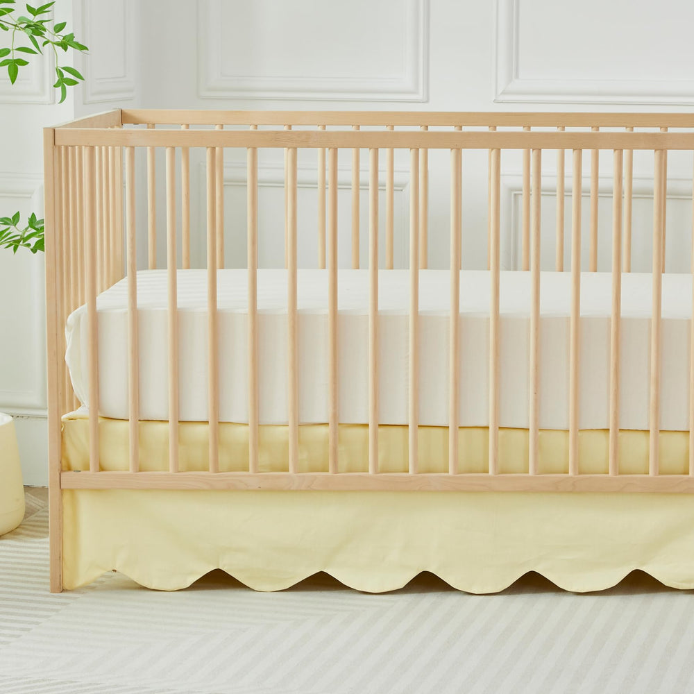 Brandream scallop edge crib skirt adds soft yellow charm to the nursery