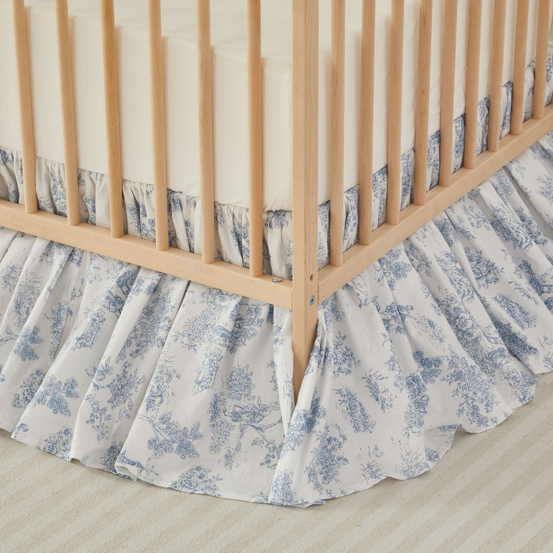 Brandream Toile floral cotton crib skirt showcases calming blue tones for nurseries