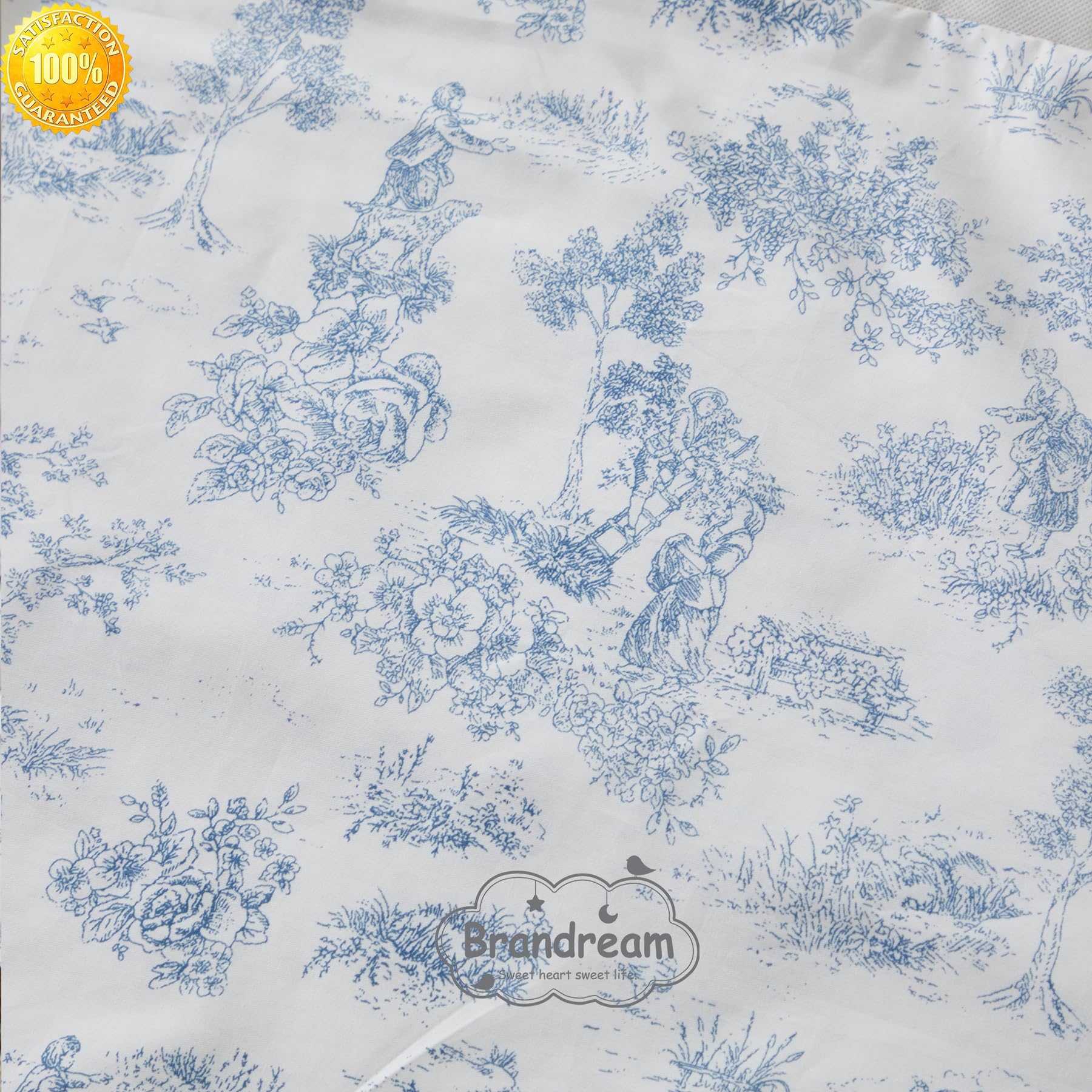 Brandream Toile Crib Skirt coordinates with nursery decor for a cohesive look.
