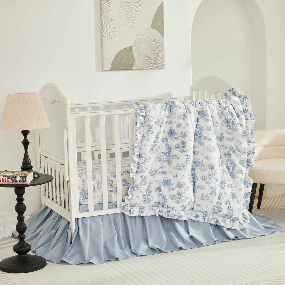 Brandream Toile crib quilt with ruffles offers a soft cotton surface for baby comfort.