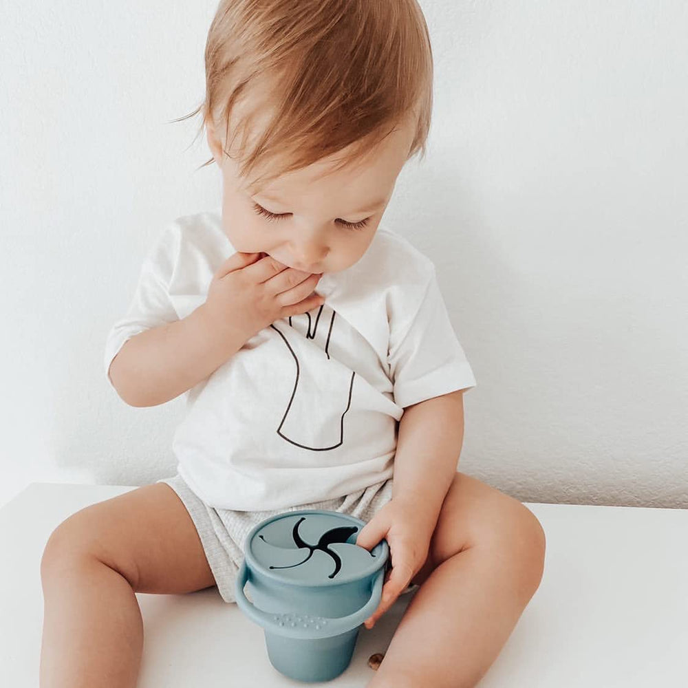 BraveJusticeKidsCo Snack Attack Cup durable silicone for daily use.