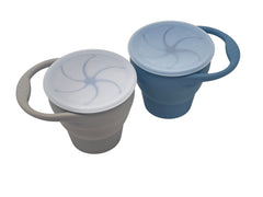 BraveJusticeKidsCo Snack Attack Cup open and collapsible for travel-friendly snacking.
