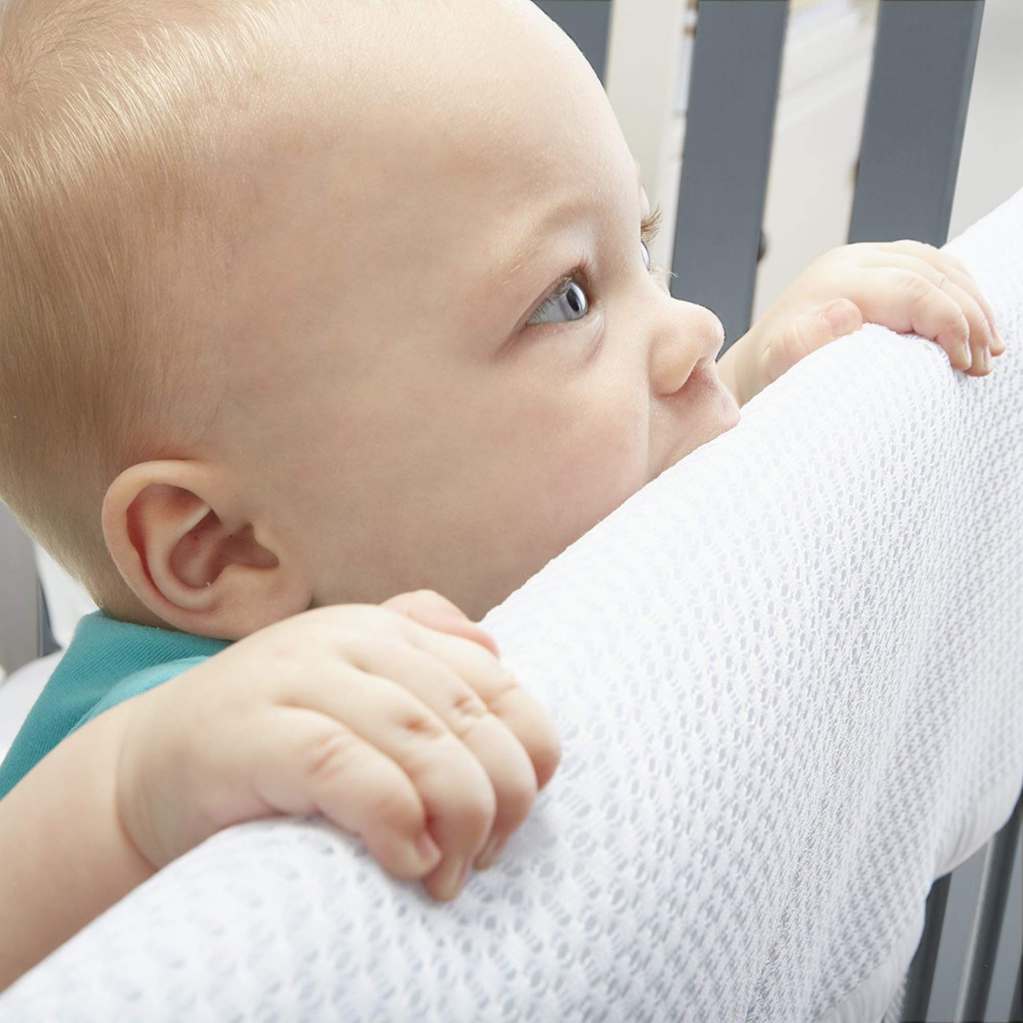 BreathableBaby long-panel on crib rail shows easy fit with hook-and-loop closure.
