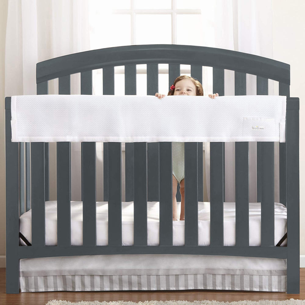 BreathableBaby RailGuard long-panel on crib rail provides teether protection and coverage.