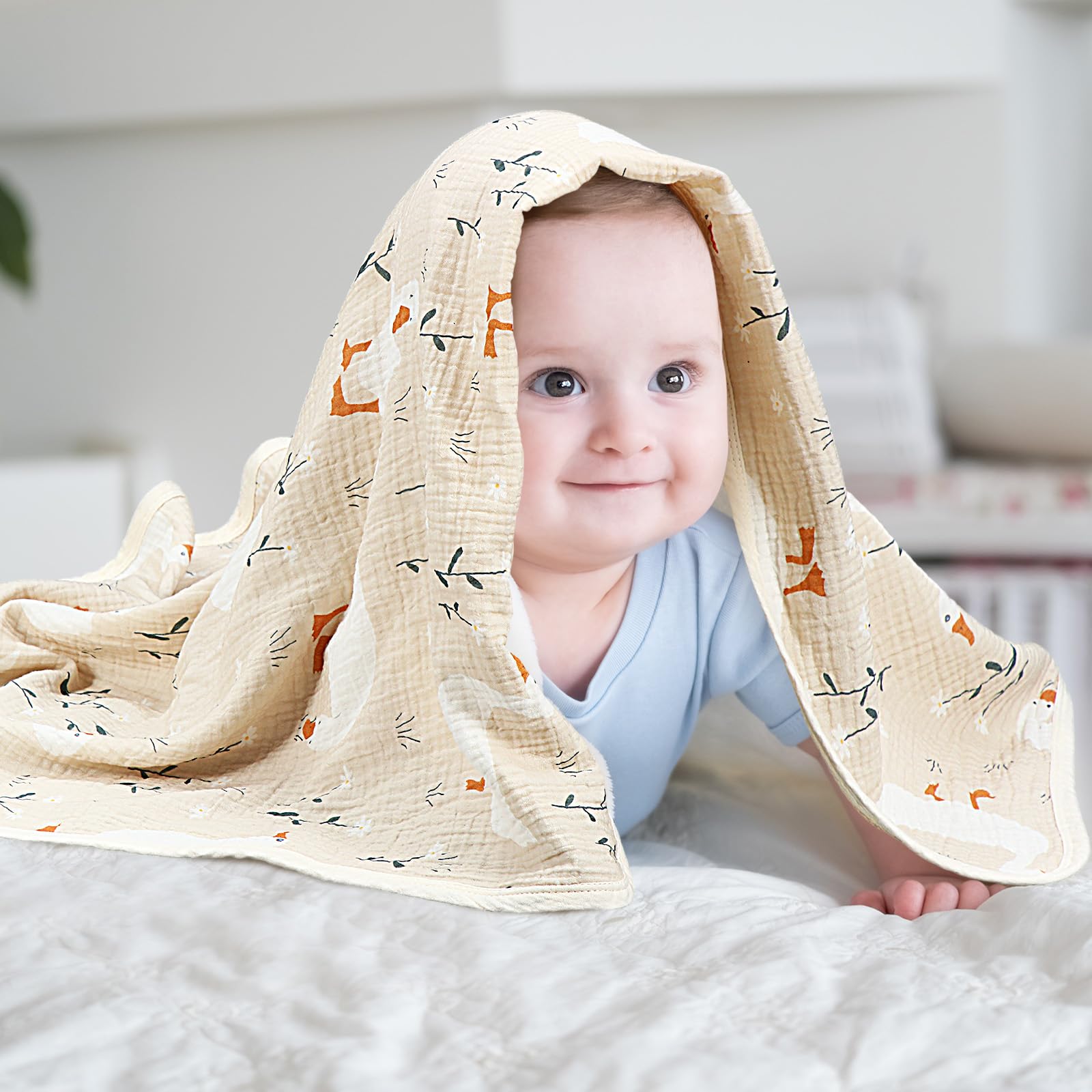 Breling Silly Goose muslin blanket shown in stroller use for on-the-go warmth