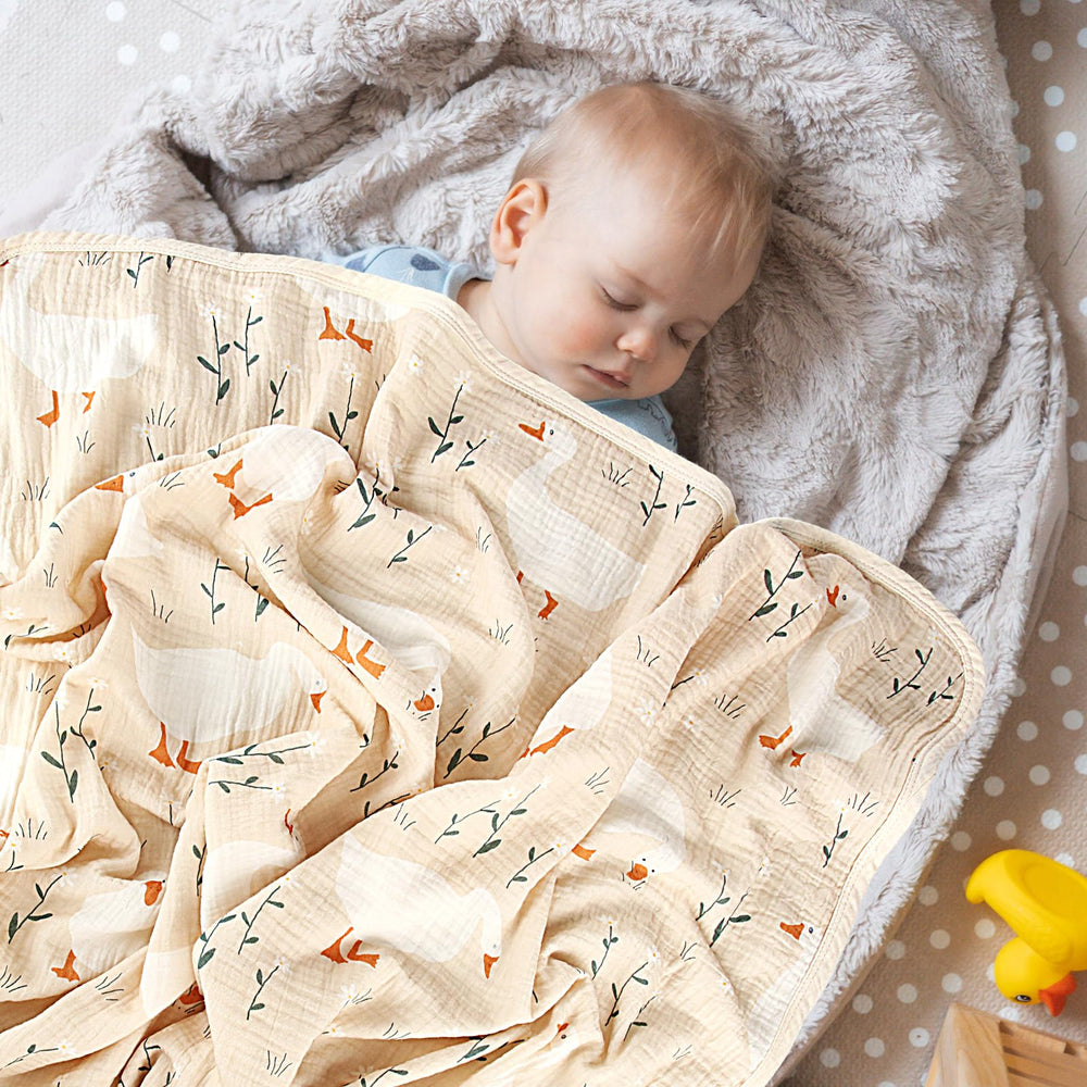 Breling Silly Goose muslin blanket nursery design complements neutral decor