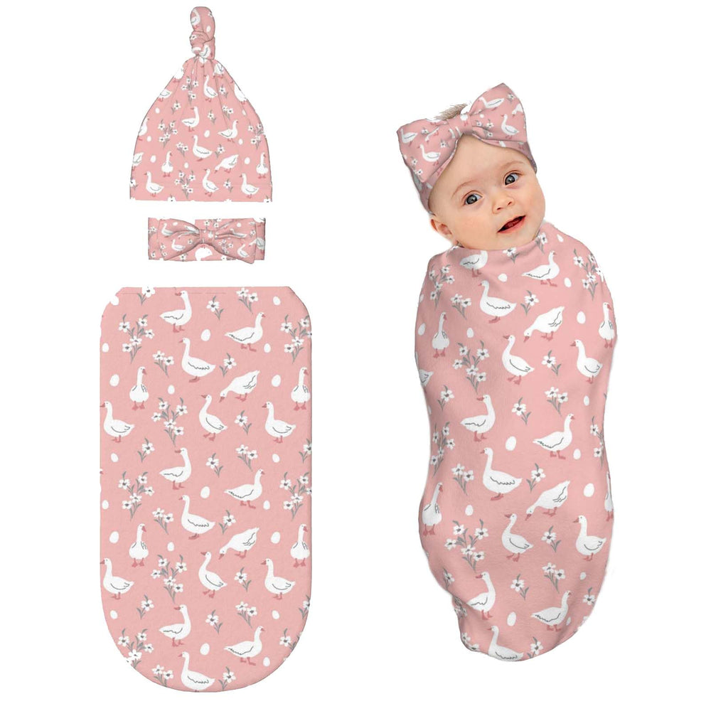 Broiteid Goose swaddle blanket with hat and headband for newborn comfort.