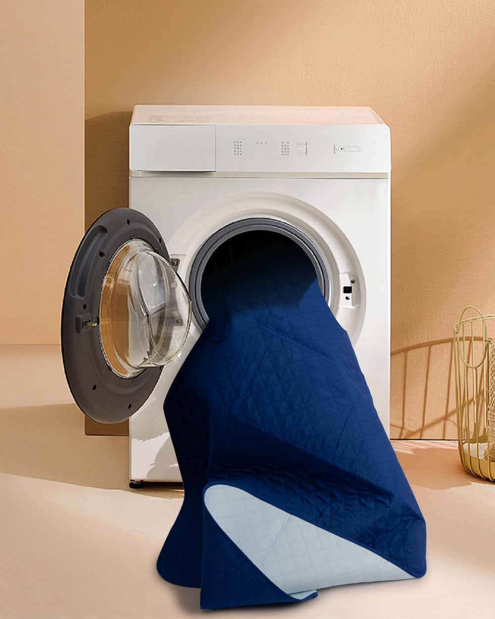 Brosive navy-blue bed pad blends with decor while protecting bedding.