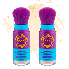 Brush On Block Bob Kids SPF 30 brush applying sunscreen for quick protection