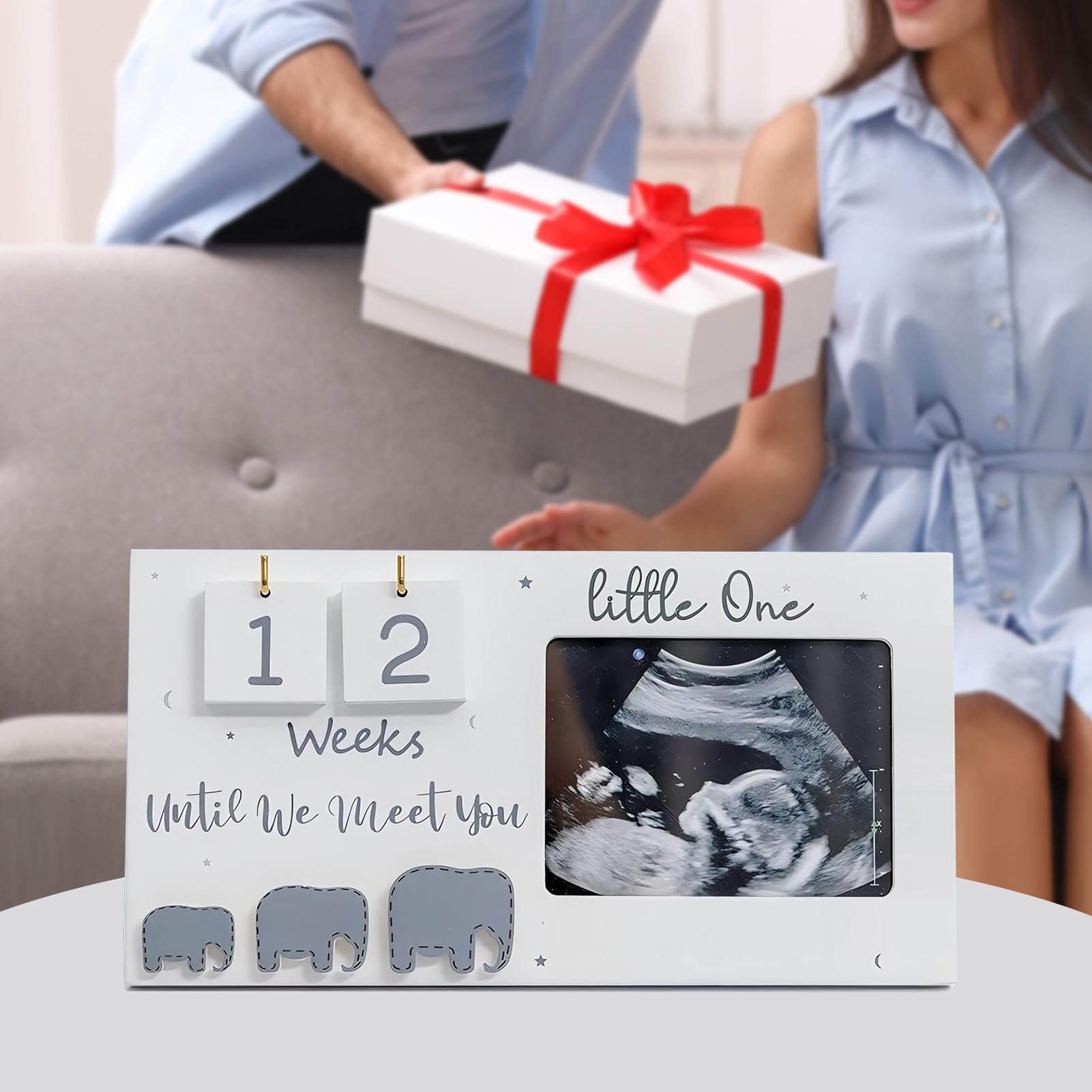 Buachois wooden nursery frame adds charming elephant motif.