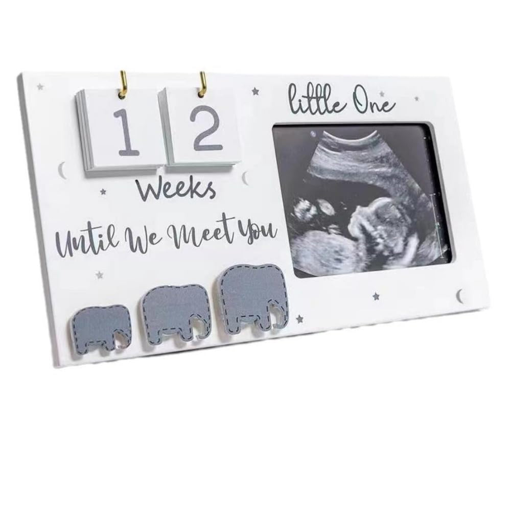 Buachois sonogram frame with elephant design in a wood finish displaying memories.