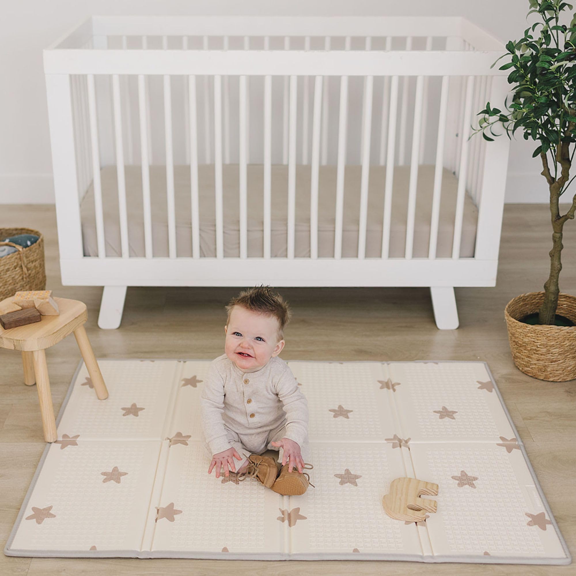 Bubba Bear baby play mat with thick foam stars for cushioned tummy time.