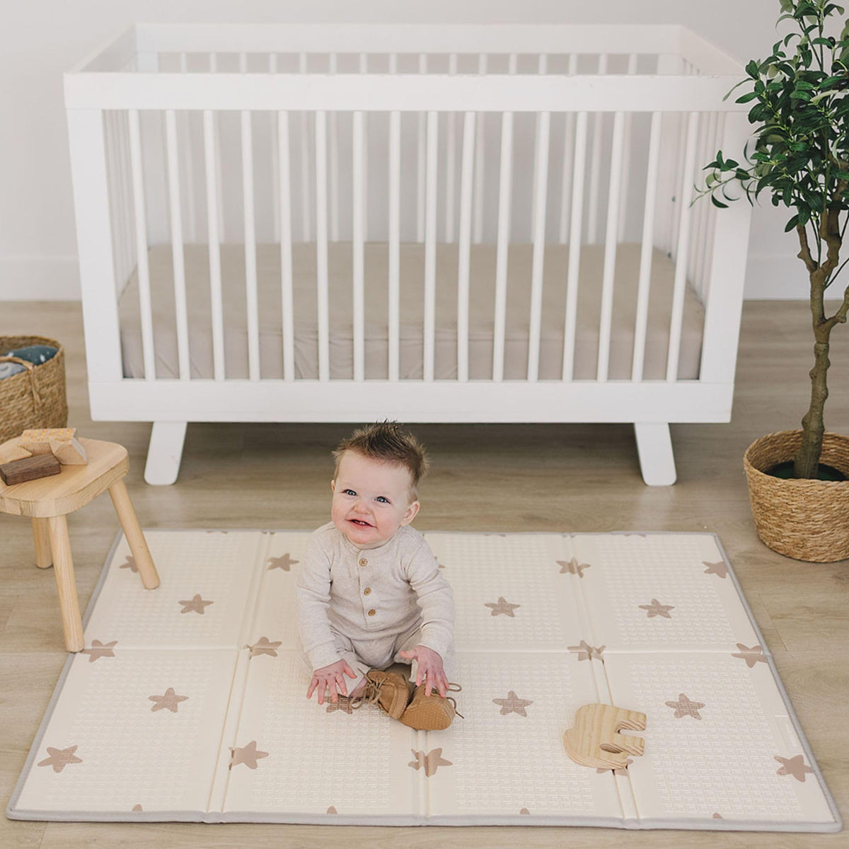 Bubba Bear baby play mat with thick foam stars for cushioned tummy time.