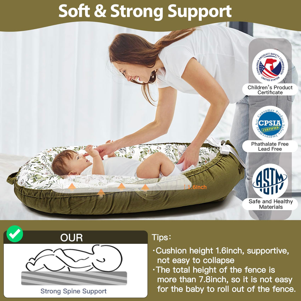Bubbyhuts Green Rabbit portable infant nest with removable cover for quick cleanup.