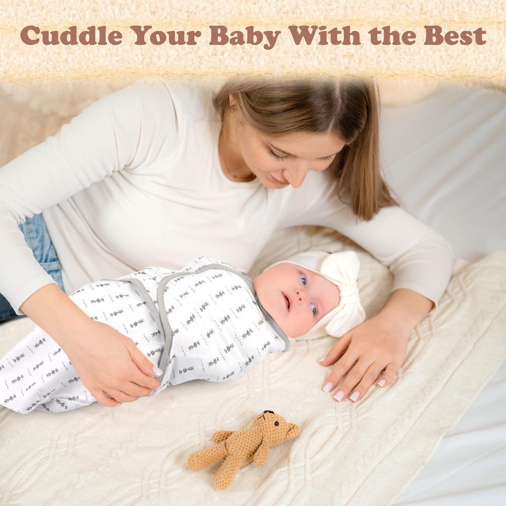 Bublo Baby grey swaddle demonstrating hip-friendly positioning for newborn sleep.