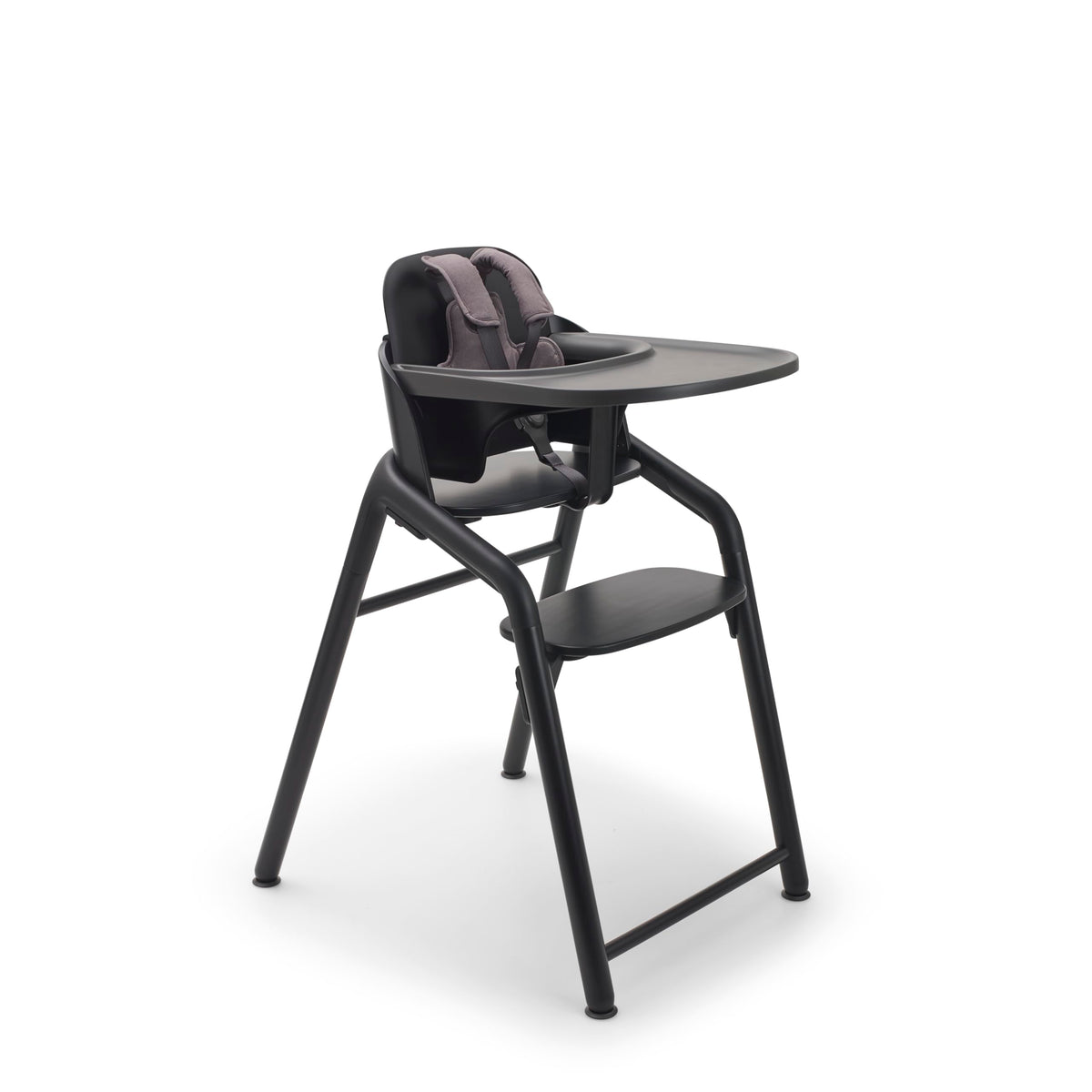 Bugaboo Giraffe high chair adjusts in one second for growing children at the table.