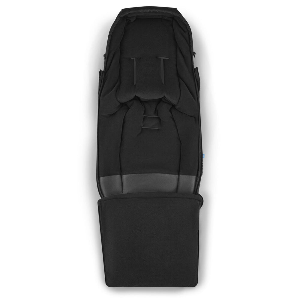Bugaboo Performance Footmuff attached to Bugaboo stroller demonstrating universal fit.