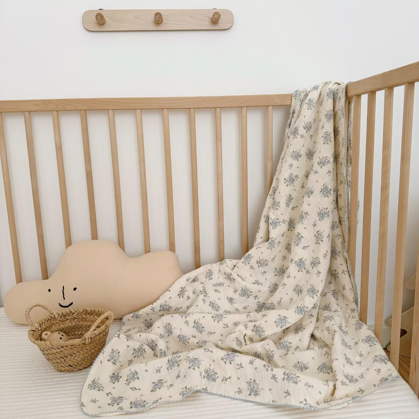 BuLuTu blue-floral muslin blanket closeup shows soft two-layer fabric for gentle comfort.