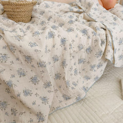 BuLuTu blue-floral pattern in nursery adds cozy aesthetic and soft touch.
