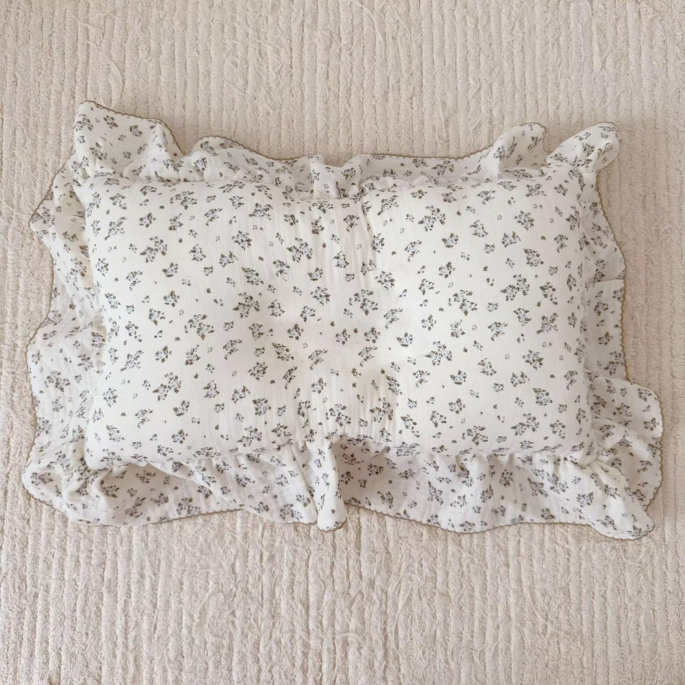 Blue floral BuLuTu pillow cover fits toddler nurseries and travel bags.