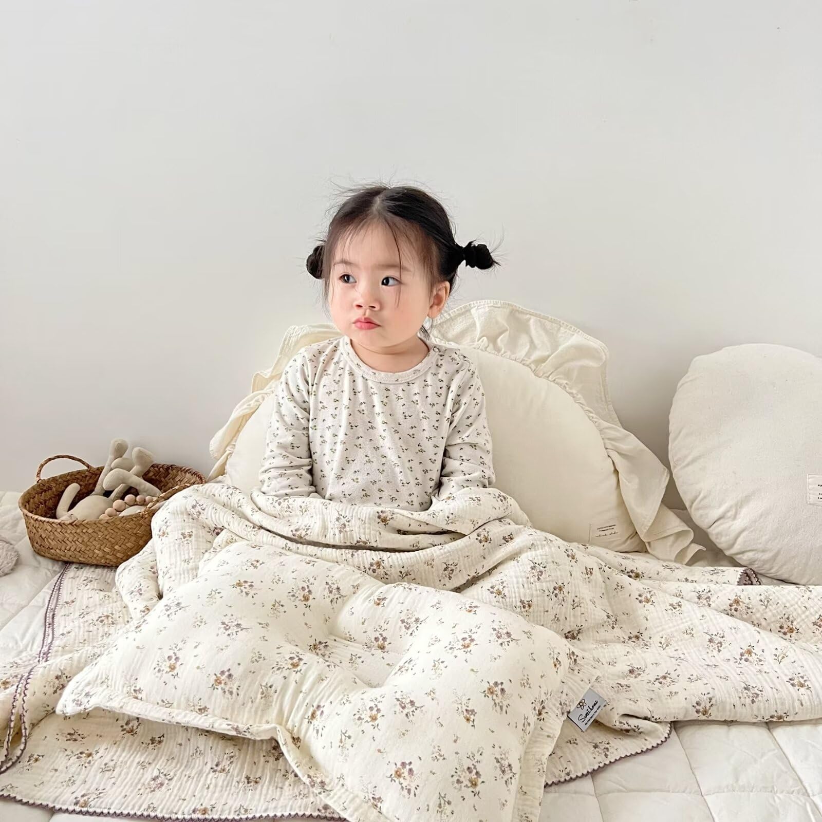 BuLuTu muslin blanket with reversible crepe floral pattern for versatile decor.