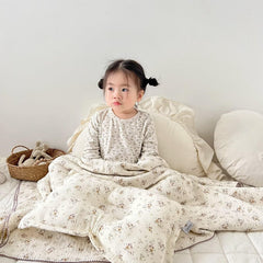 BuLuTu muslin blanket with reversible crepe floral pattern for versatile decor.