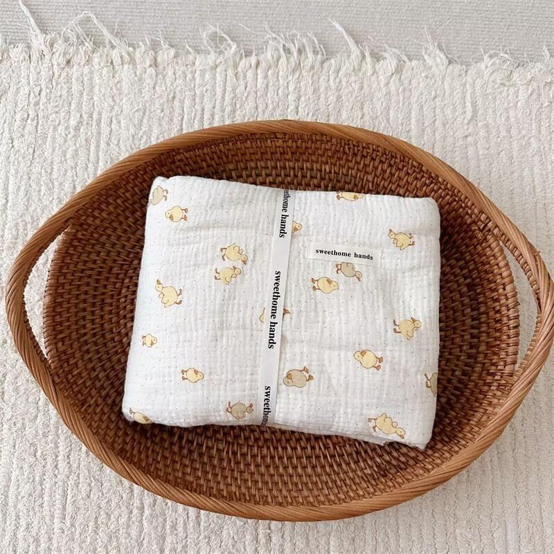 BuLuTu muslin cotton blanket close-up shows breathable weave for hot days.