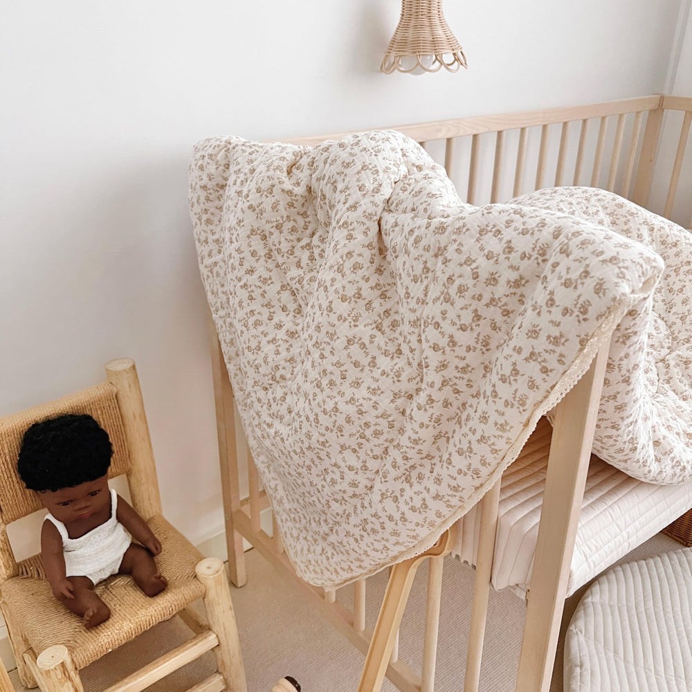 BuLuTu muslin cotton blanket in a nursery setting highlighting breathable touch