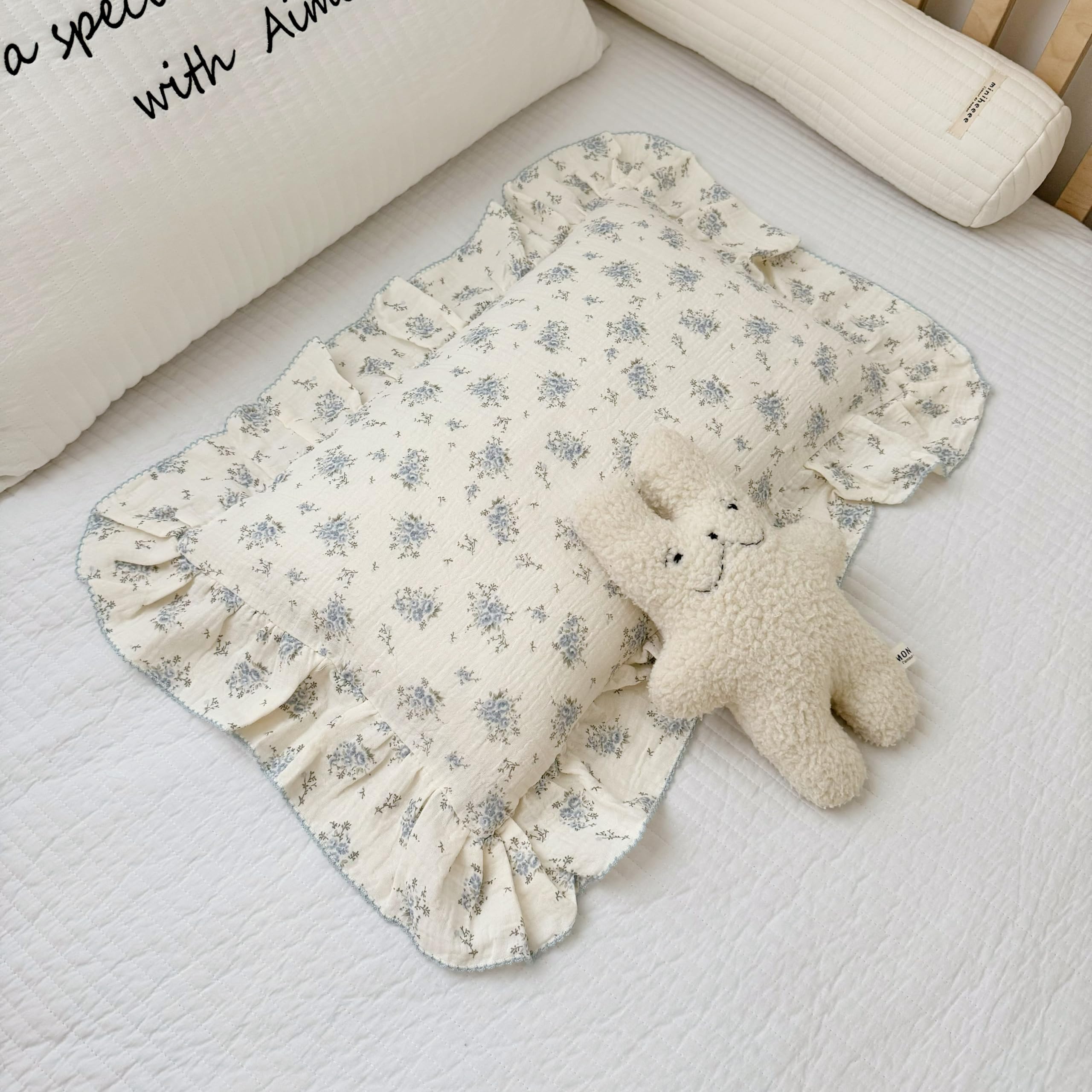BuLuTu muslin cotton pillowcase with blue floral ruffles for gentle, breathable sleep.