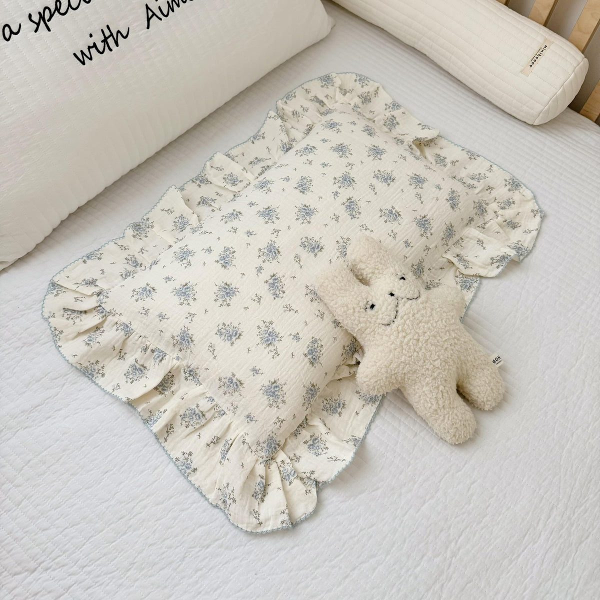 BuLuTu muslin cotton pillowcase with blue floral ruffles for gentle, breathable sleep.