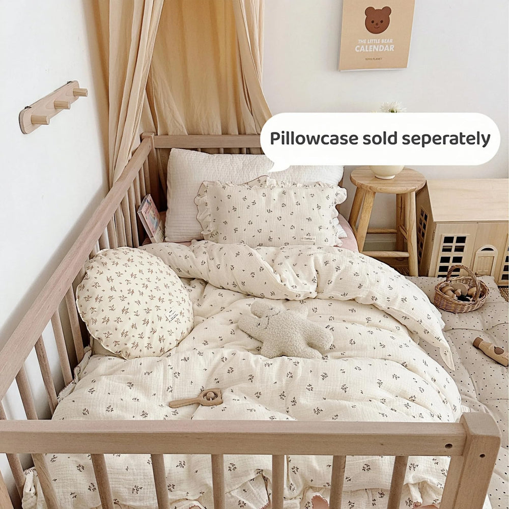 Soft muslin cotton texture close-up shows breathable, skin-friendly fabric.