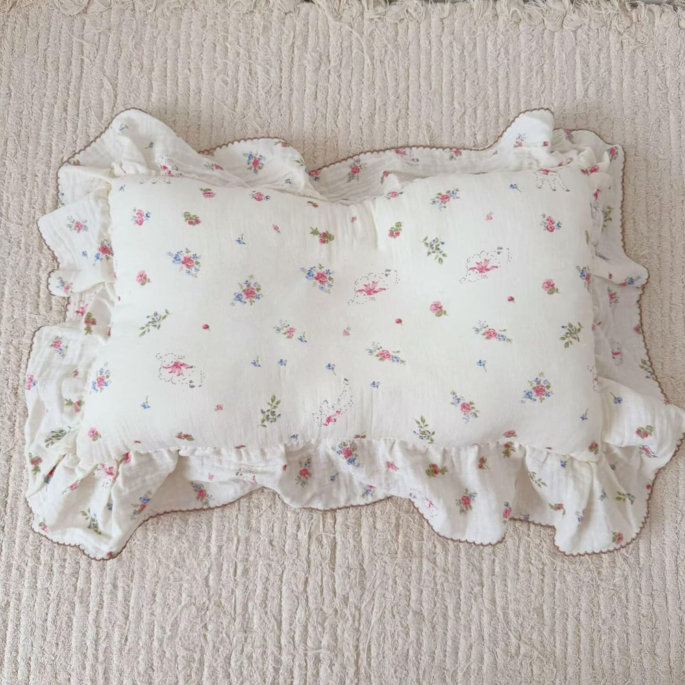 BuLuTu pillow cover adds nursery decor with charming pink flowers for coordinated spaces.