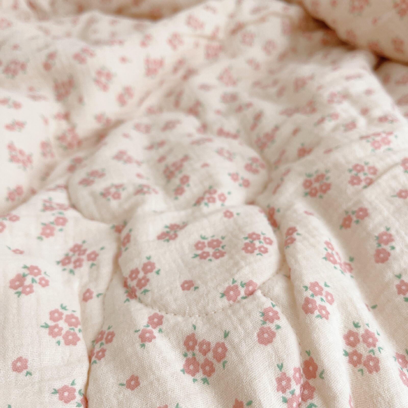BuLuTu quilted blanket 47x59 provides practical crib size.