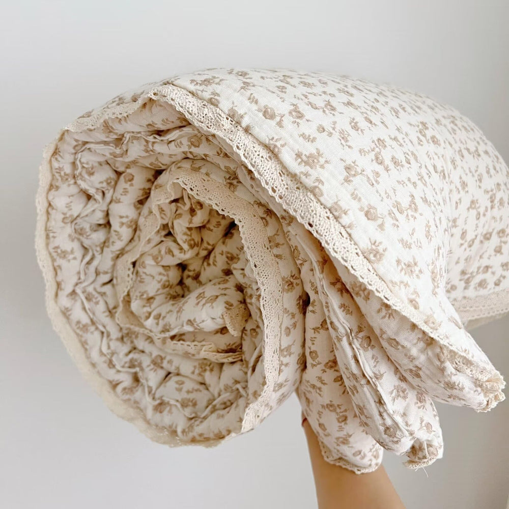Soft sleep aid BuLuTu blanket on a cozy toddler bed