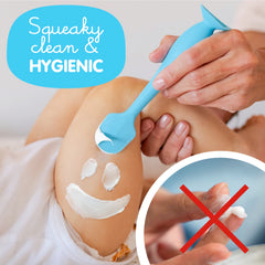 Bumco soft silicone spatula gliding smoothly on baby's skin