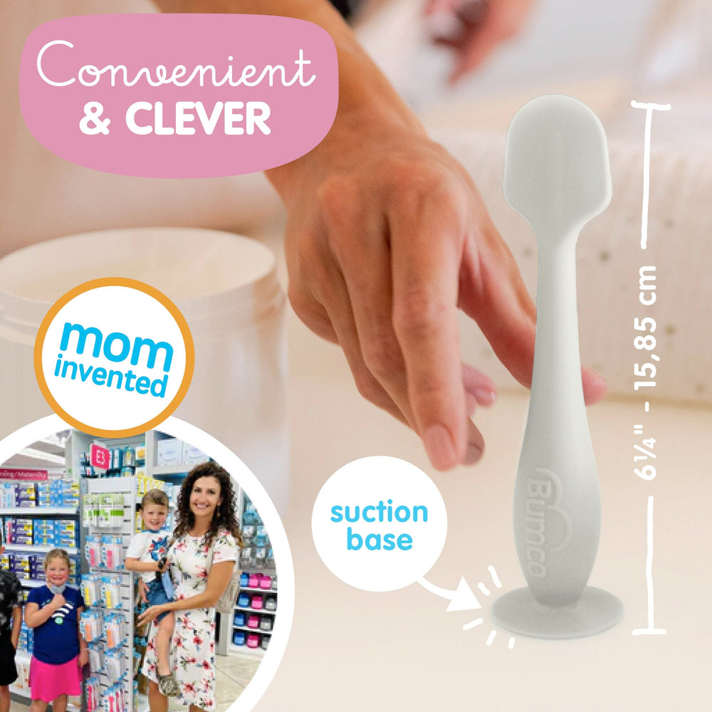 Bumco diaper cream spatula applying cream smoothly.