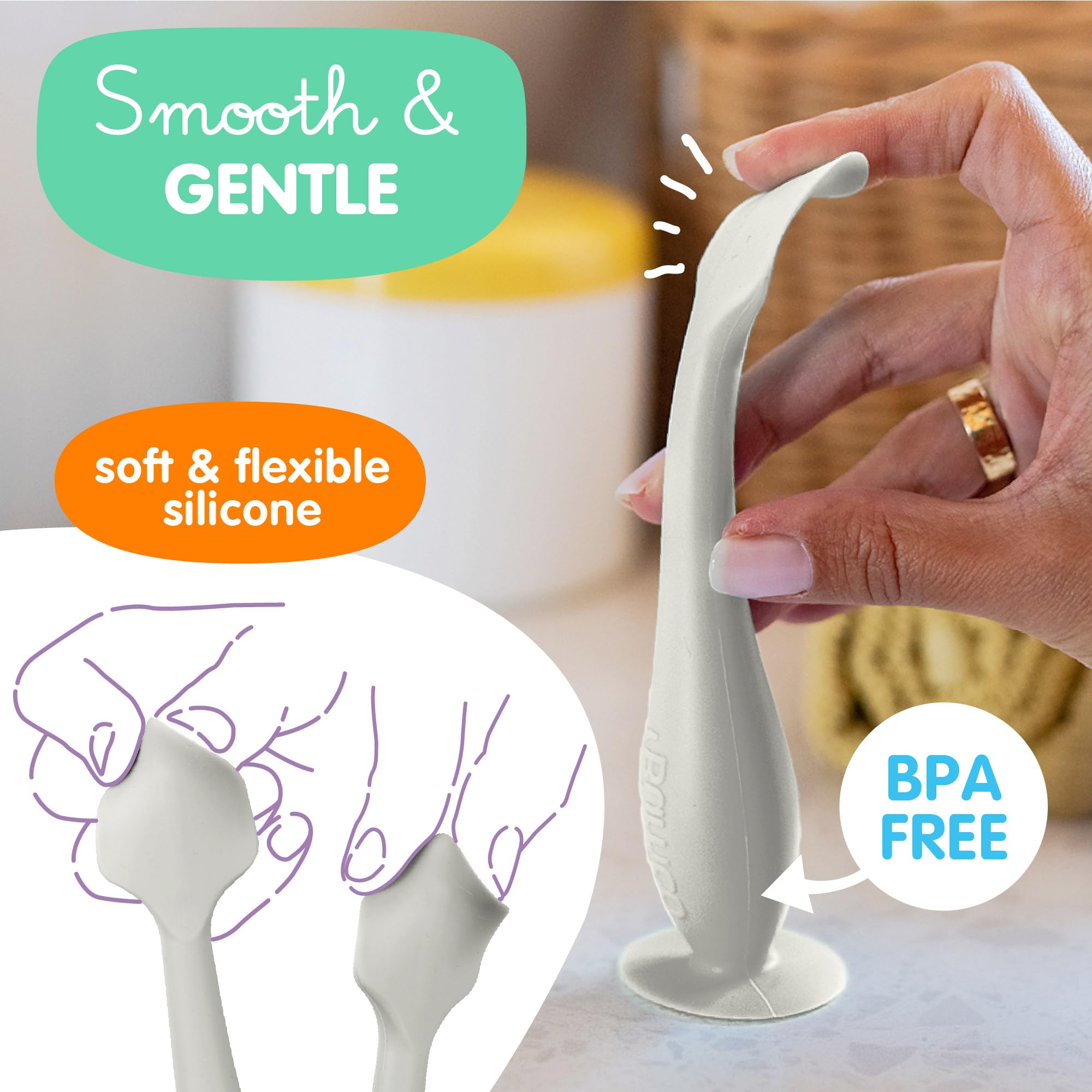 Bumco spatula with suction base stands upright on a surface.
