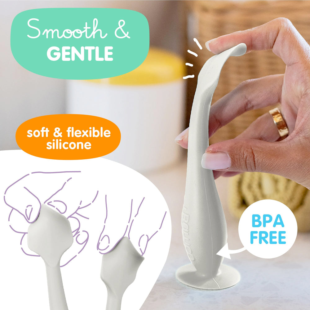 Bumco spatula with suction base stands upright on a surface.