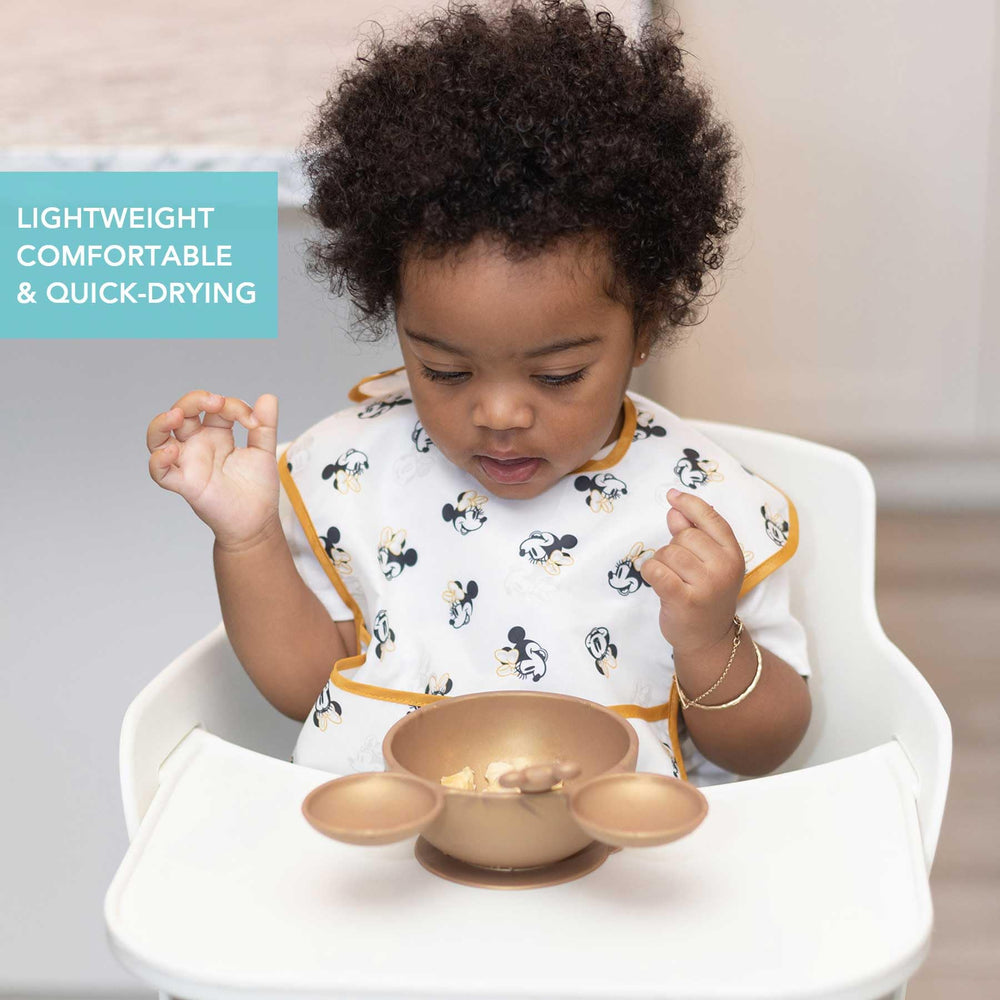 Waterproof Bumkins fabric keeps clothes dry during meals.