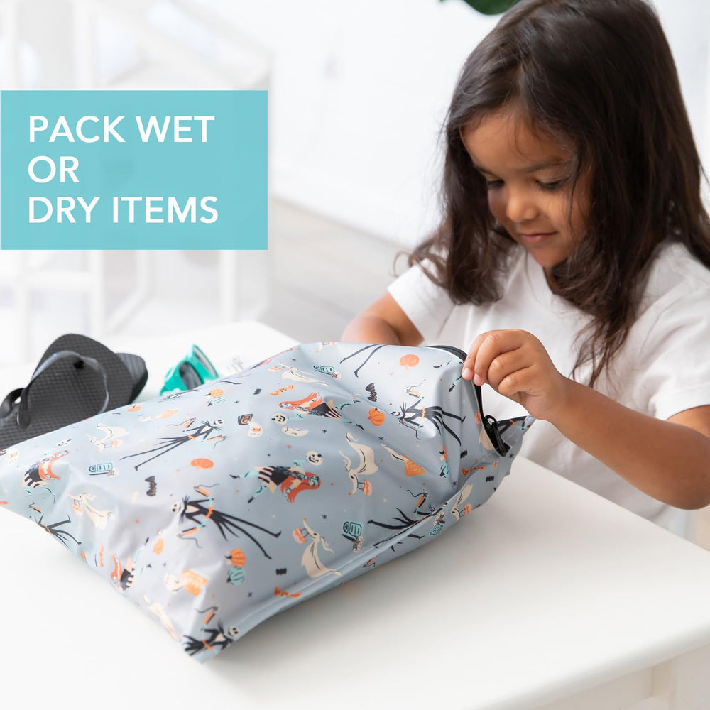 Two Bumkins NBC wet bags organized for on-the-go storage.
