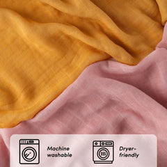 Bunnikins & Clover muslin swaddle blanket shows generous 47x47 inch size