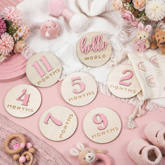 Burbell pink birth name card supports personalized baby documentation in photos