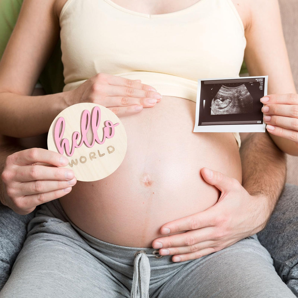 Burbell pink milestone signs offer a gentle, gender-neutral touch for memories.