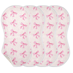 Burbuja pink bow muslin burp cloth front view, four-layer softness and high absorbency.