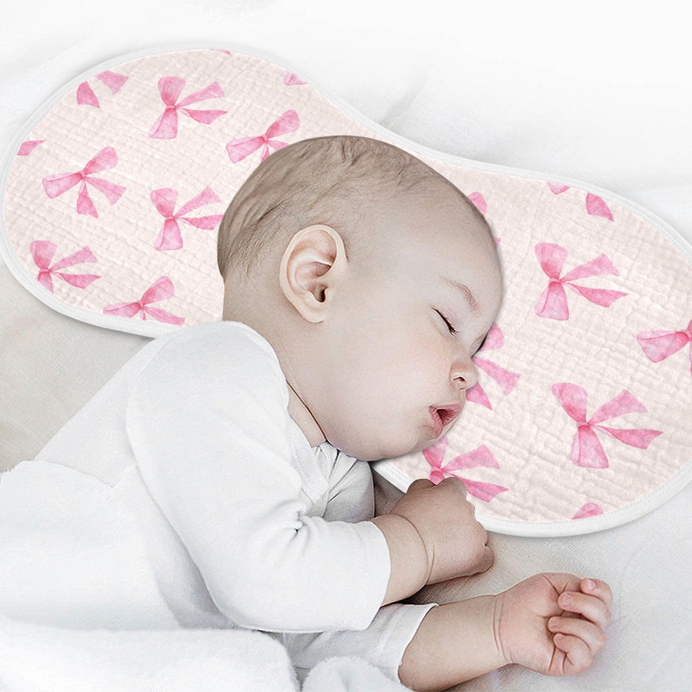 Burbuja pink bow muslin burp cloth with exquisite hemmed edge.
